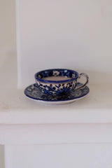 Set of 4 tea cups and saucers